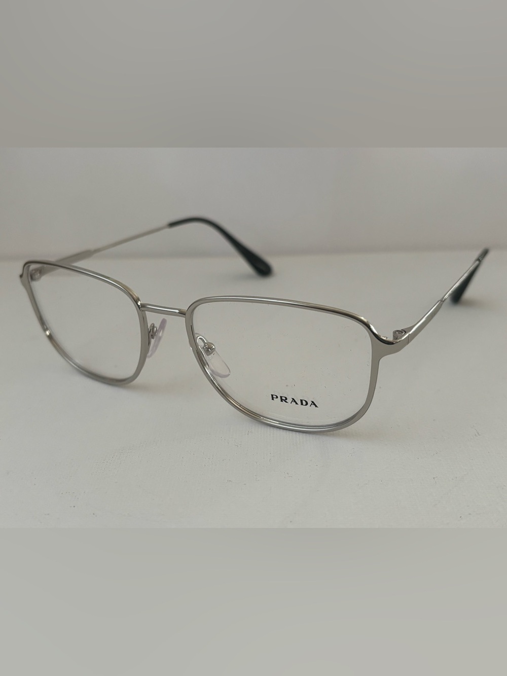 Prada Men’s Silver Metal Eyeglasses with Black Temple Tips